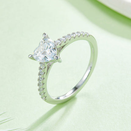 Micropaved heart-shaped moissanite ring